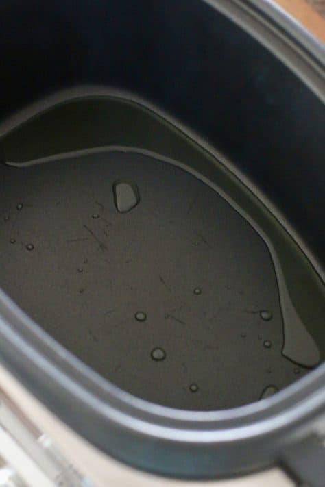 oil shown in slow cooker.