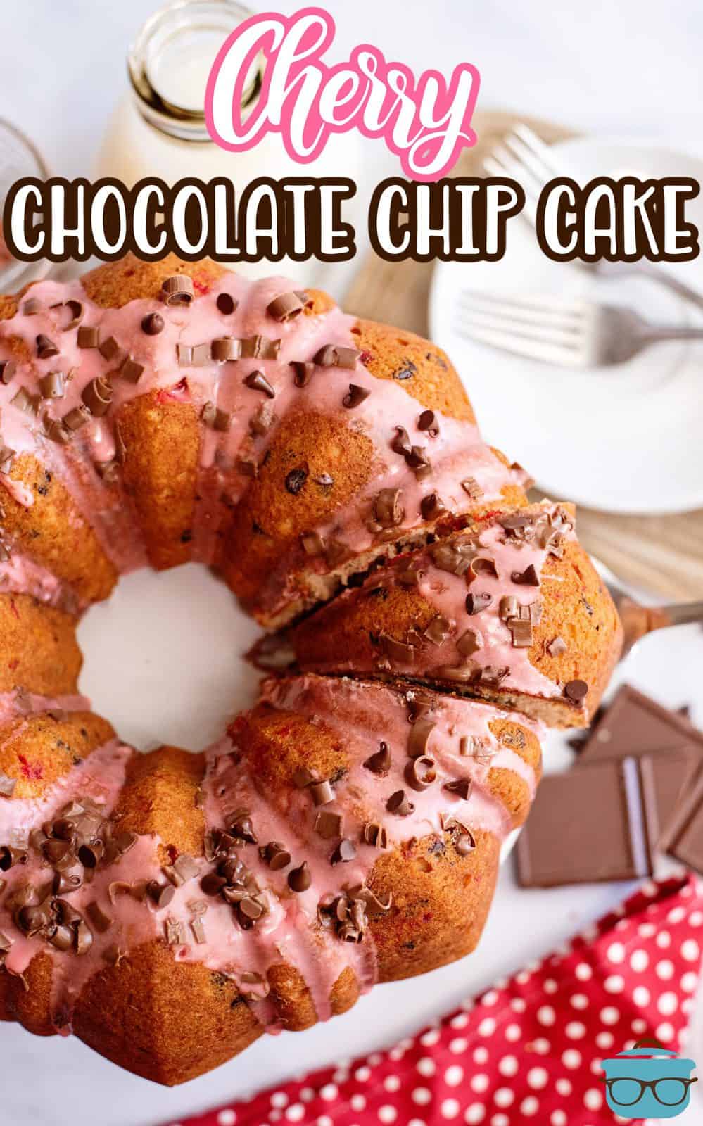 Overhead of full Cherry Chocolate Chip Cake with one piece cut Pinterest image.