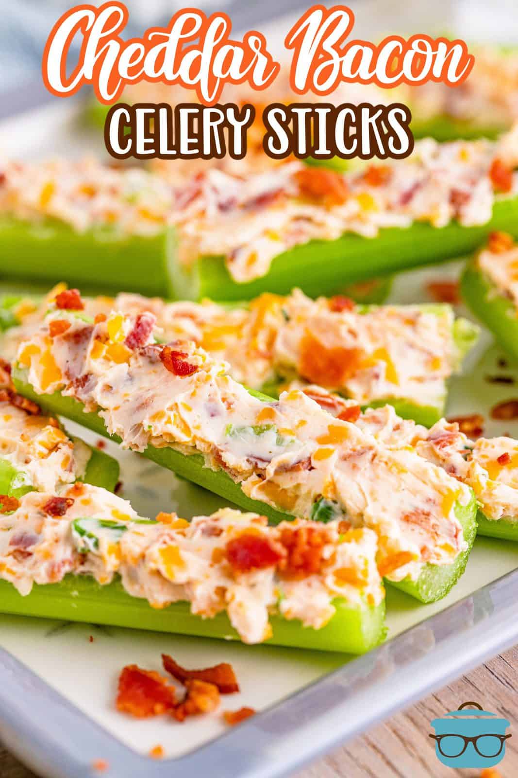 Cheddar Bacon Celery Sticks on platter slightly stacked Pinterest image.