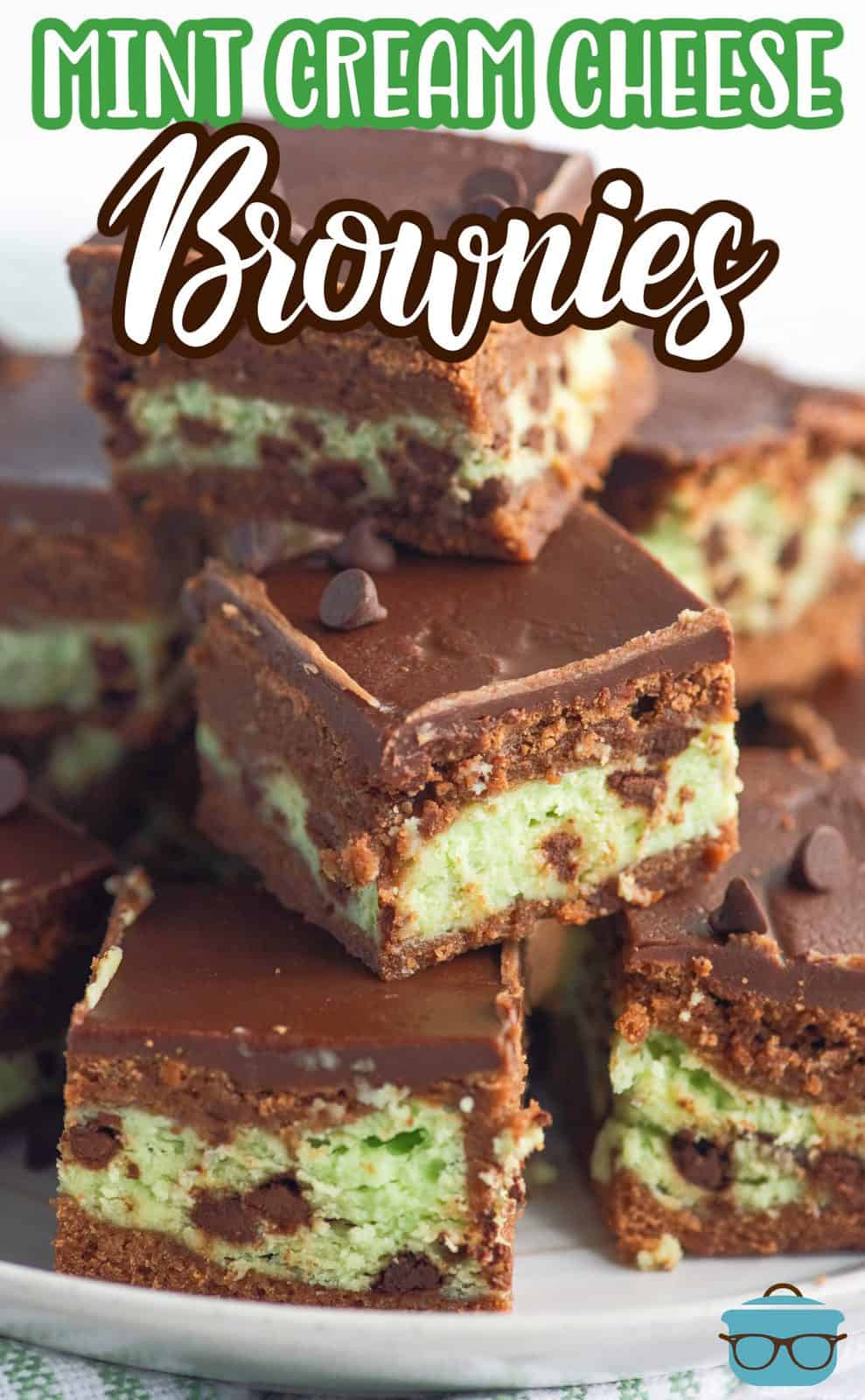 Pinterest image of stacked Mint Cream Cheese Brownies on white plate.