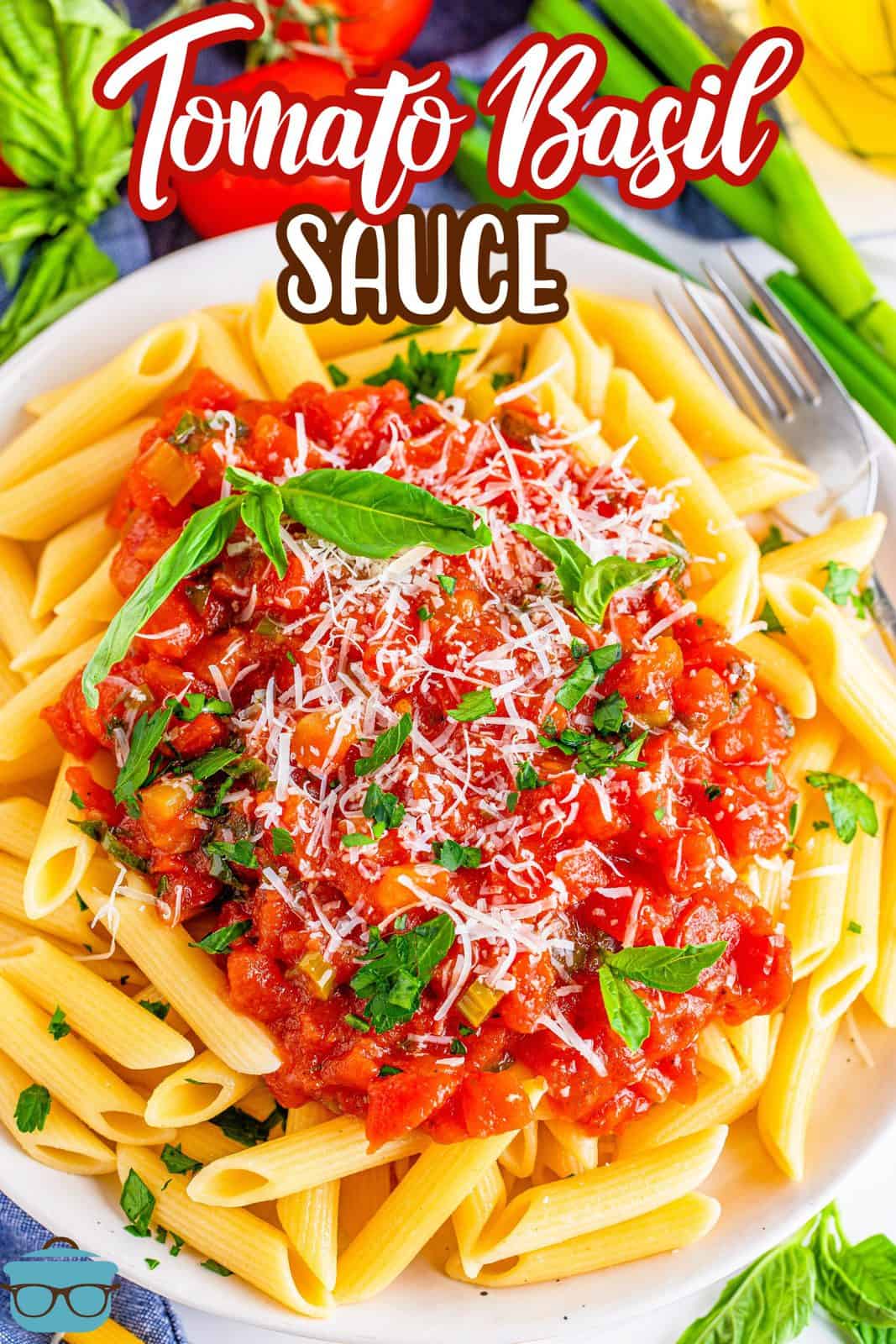 Pinterest image of Easy Tomato Basil Sauce over pasta garnished with basil leaves.