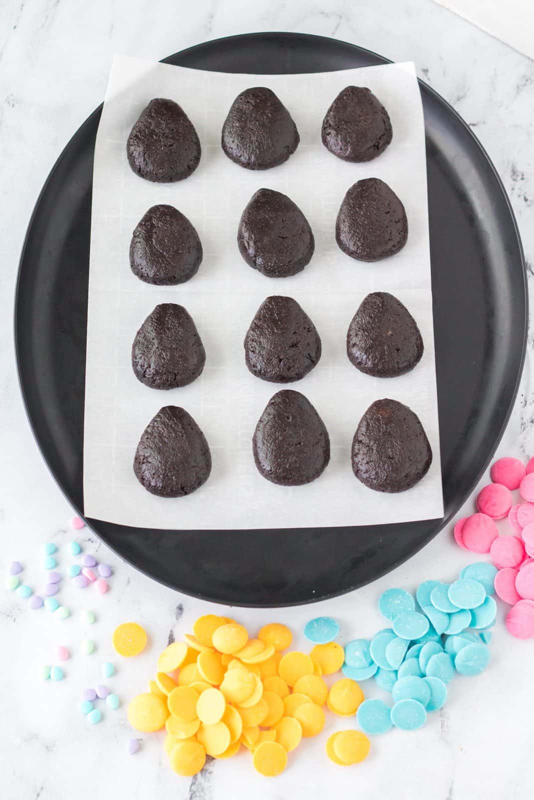 Oreos mixture portioned and shaped into eggs.