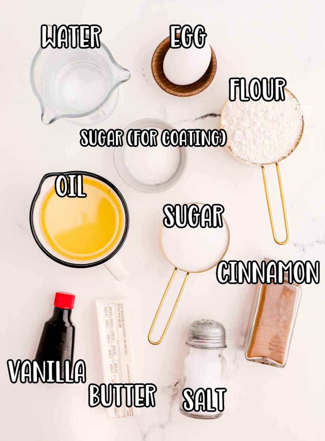 water, egg, flour, sugar, oil, cinnamon, butter, vanilla extract and salt.