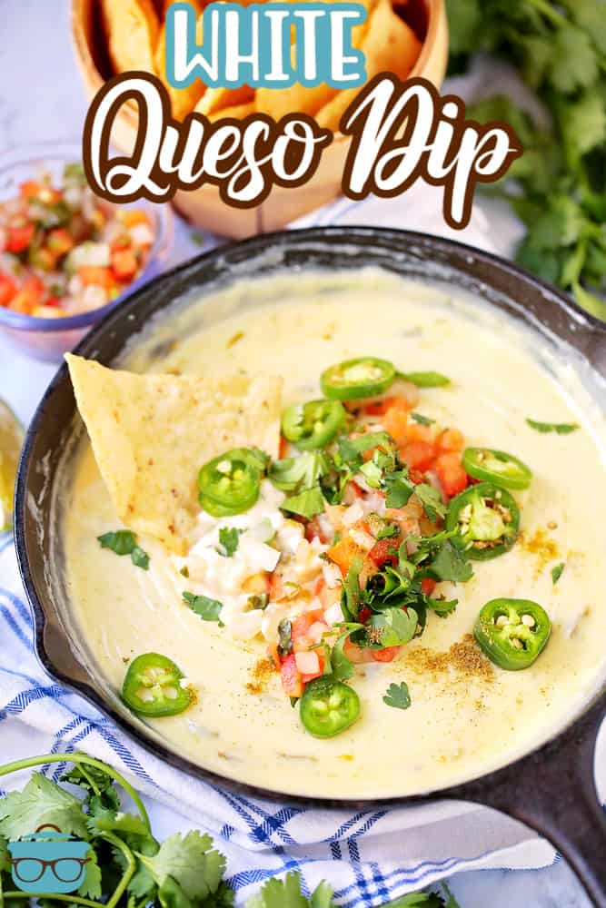 Pinterest image of finished Skillet White Queso Dip garnished with chip in dip.