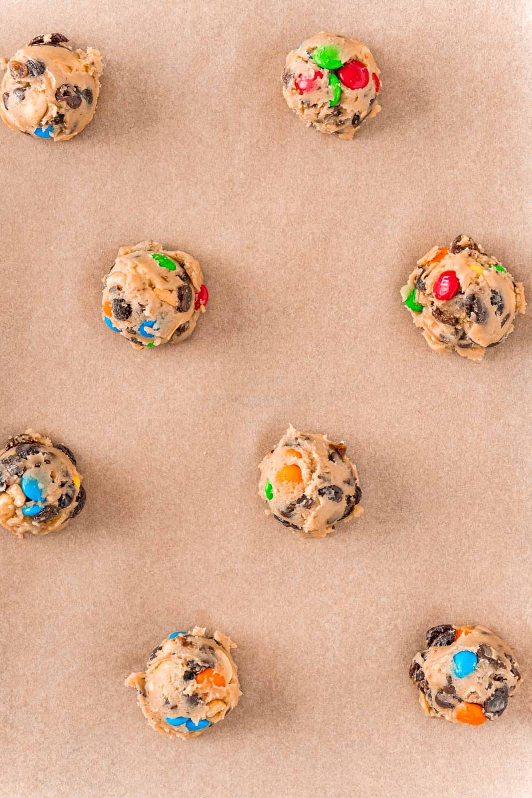 Cookies placed on parchment lined baking sheet.