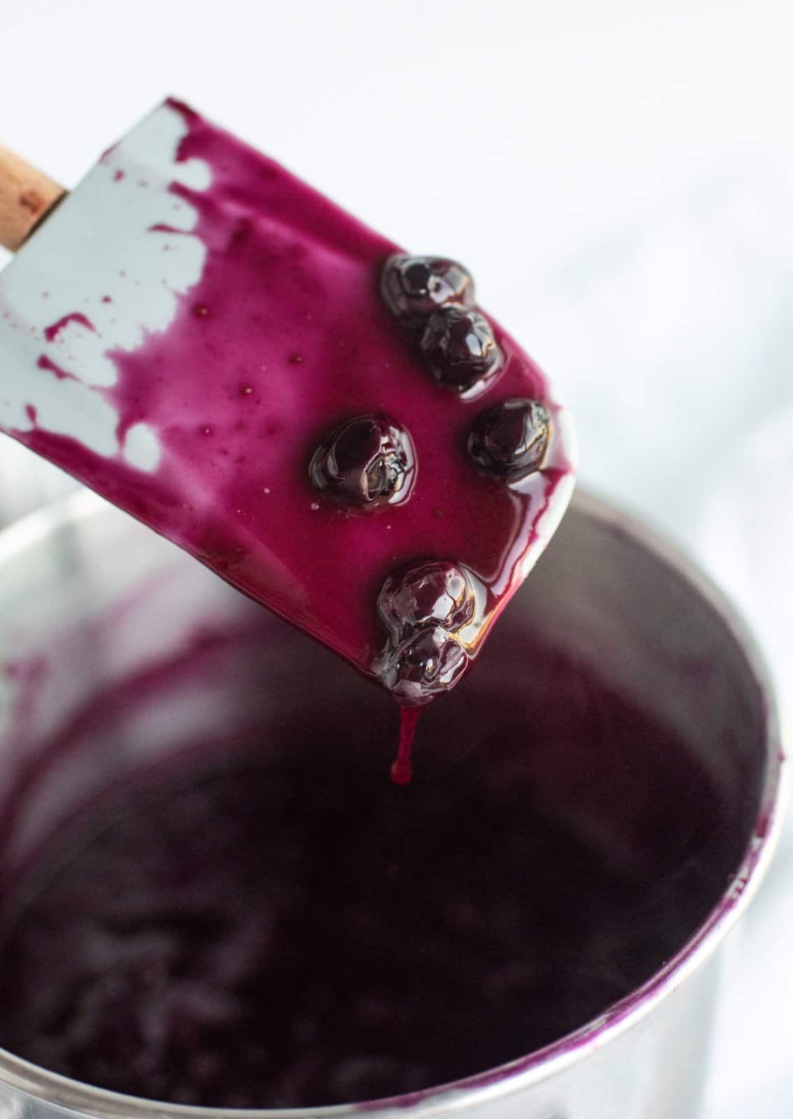 Blueberry sauce made up in pan.