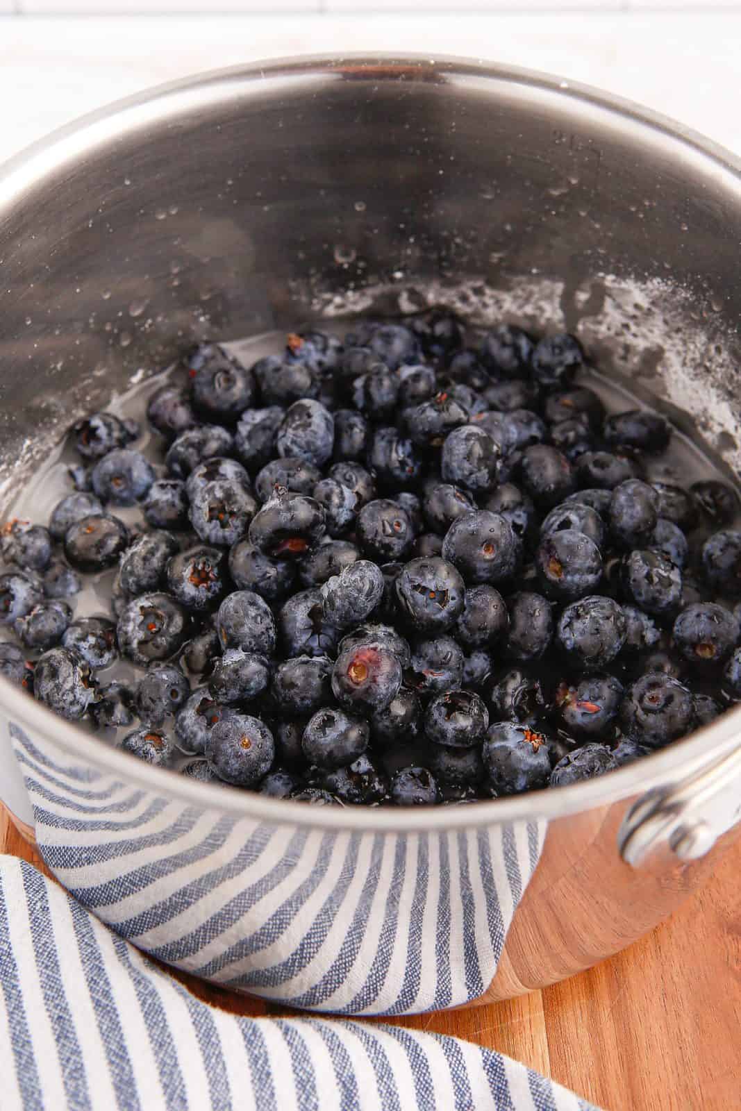 Blueberries, water, lemon juice and vanilla added to the sugar and cornstarch mixture.