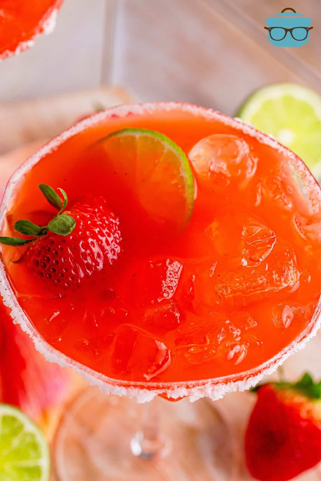 Overhead of one of the Strawberry Margaritas showing garnishes.