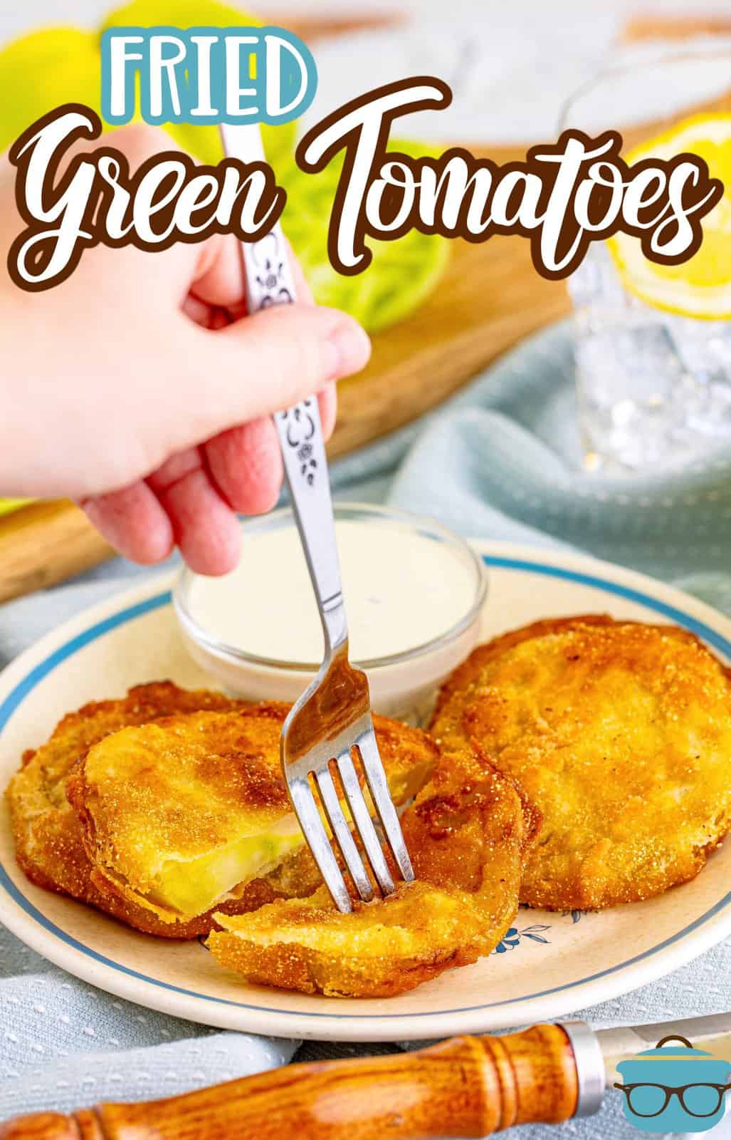 Pinterest image of fork poking into one of the Fried Green Tomatoes on plate.