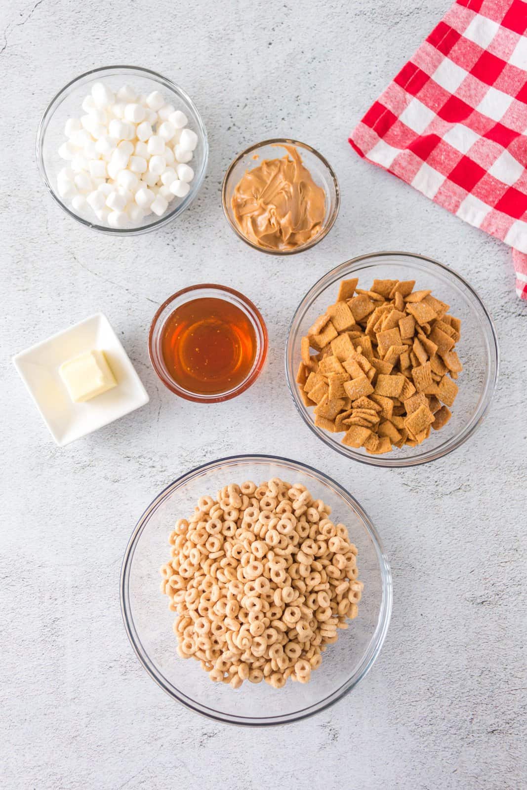 Ingredients needed: unsalted butter, mini marshmallows, honey, peanut butter, cheerios and golden grahams.