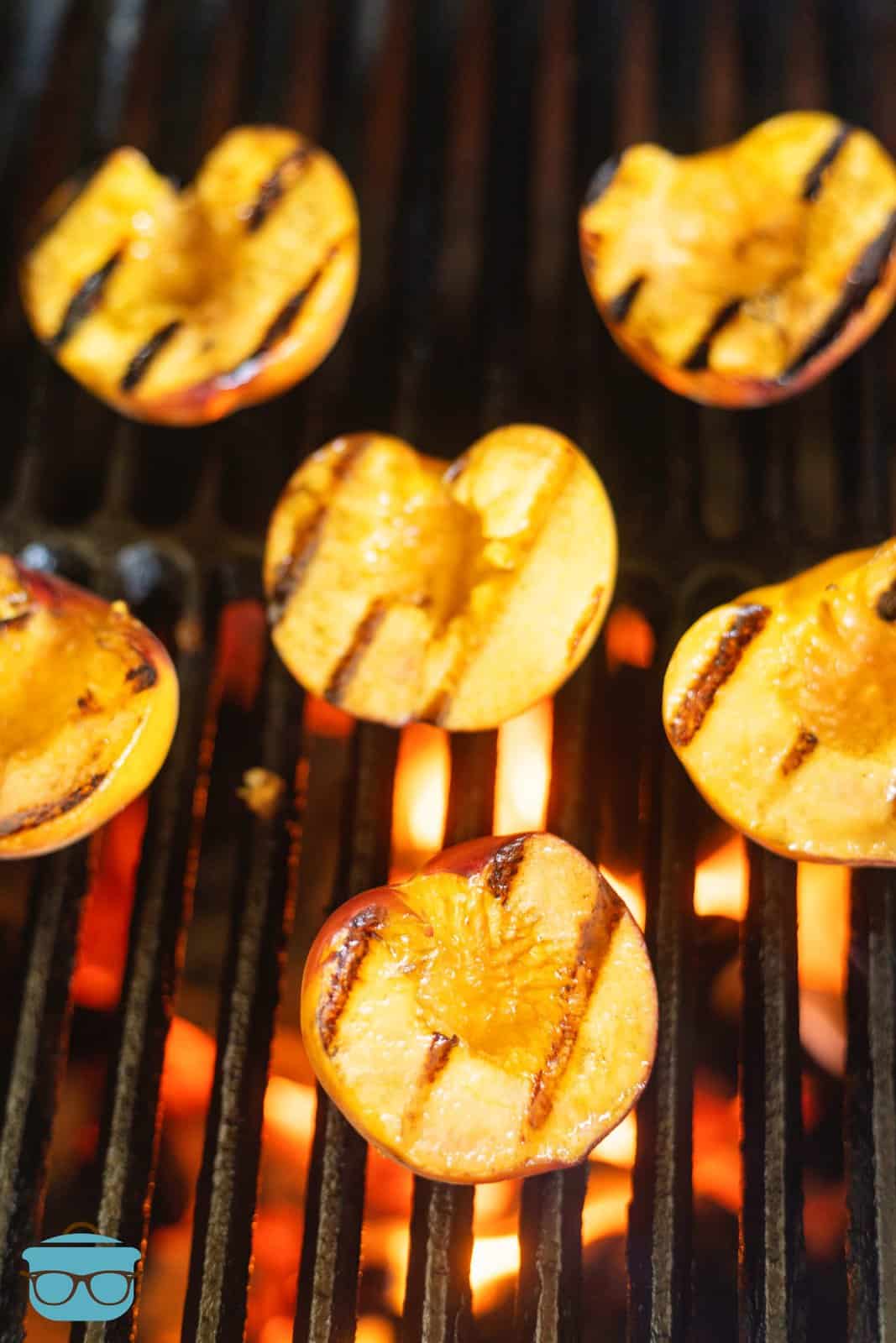Cut side of peaches up on grill.