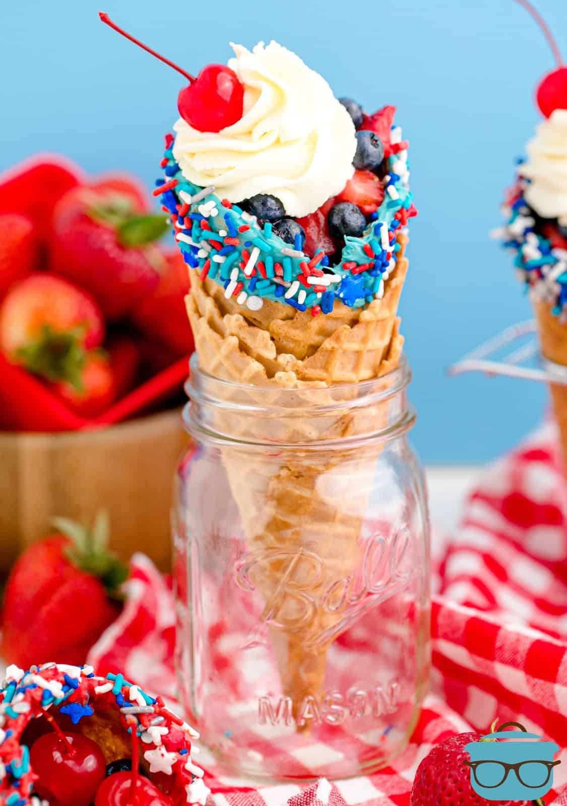 One of the 4th of July Waffle Cones in a mason jar filled and decorated.