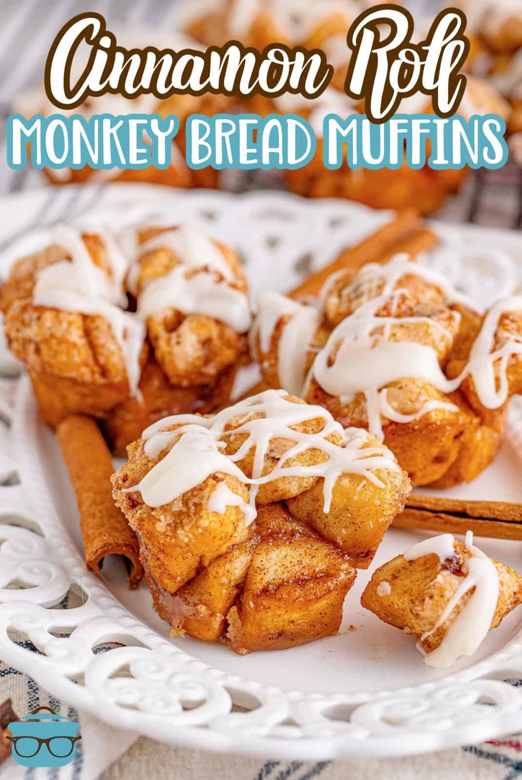 Pinterest image of Cinnamon Roll Monkey Bread Muffins on white plate with bite removed covered in glaze.