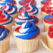 Close up square image of 4th of July Cupcakes decorated on wire rack.