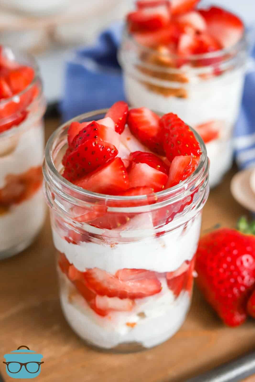 Overhead of one Strawberry Shortcake in a Jar showing strawberry topping.