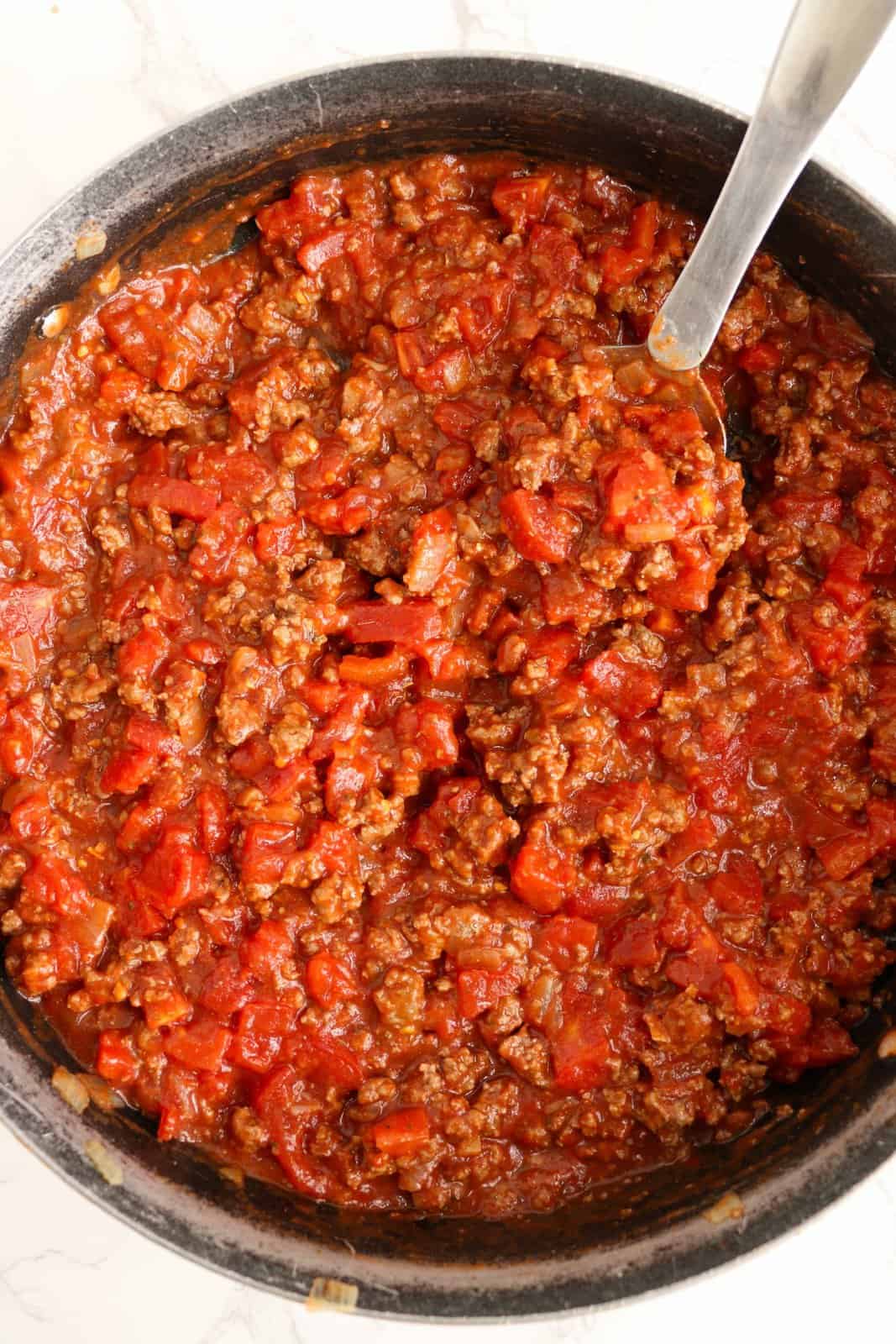 Tomato mixture added to beef mixture.