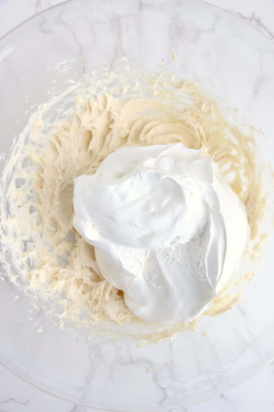 Beaten cream cheese mixture with cool whip added.