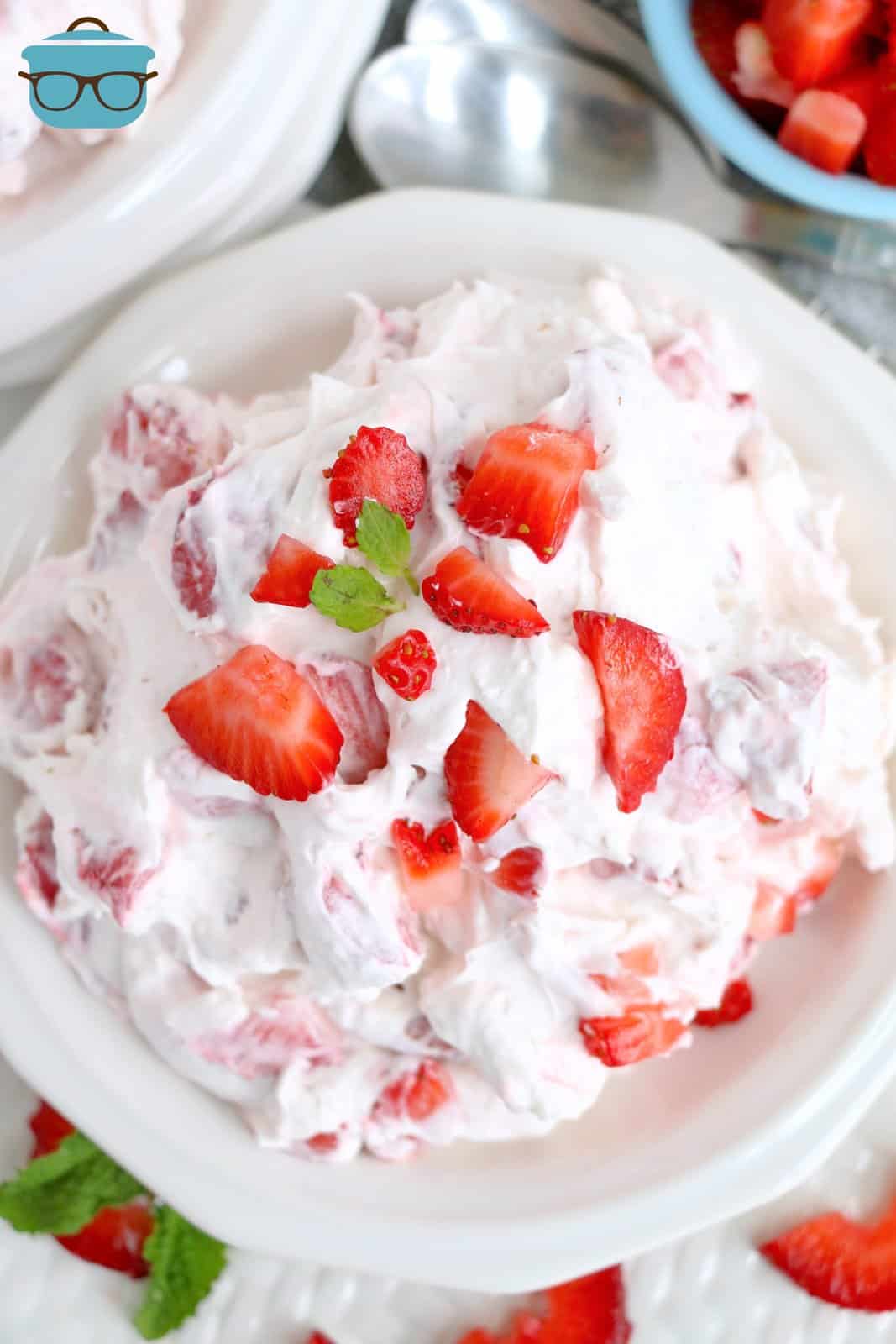 Overhead of Strawberry Cheesecake Fluff showing strawberries and mint.