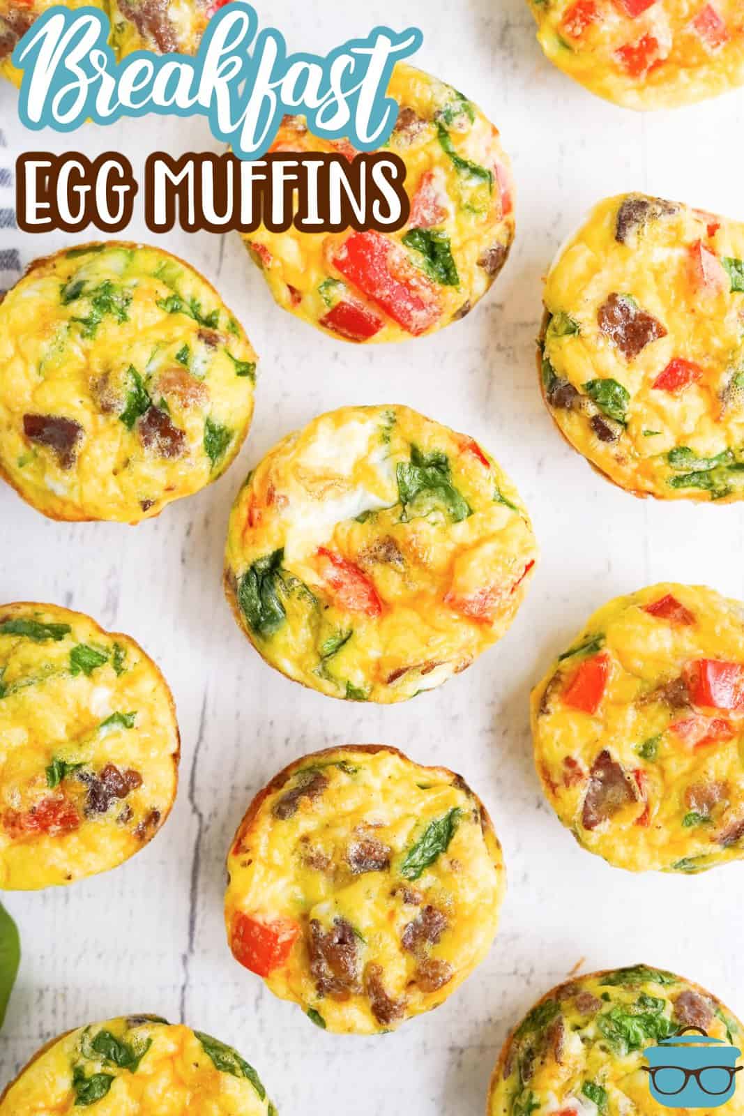 Pinterest image of Breakfast Egg Muffins on white board overhead.
