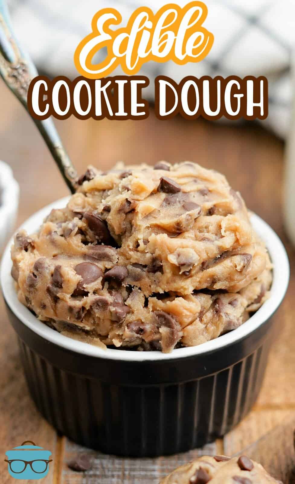 Pinterest image close up of Edible Chocolate Chip Cookie Dough with spoon in ramekin.