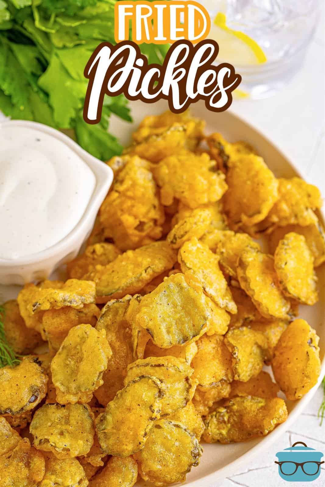Pinterest image of overhead of plate filled with Fried Pickles with ranch dipping sauce in bowl.