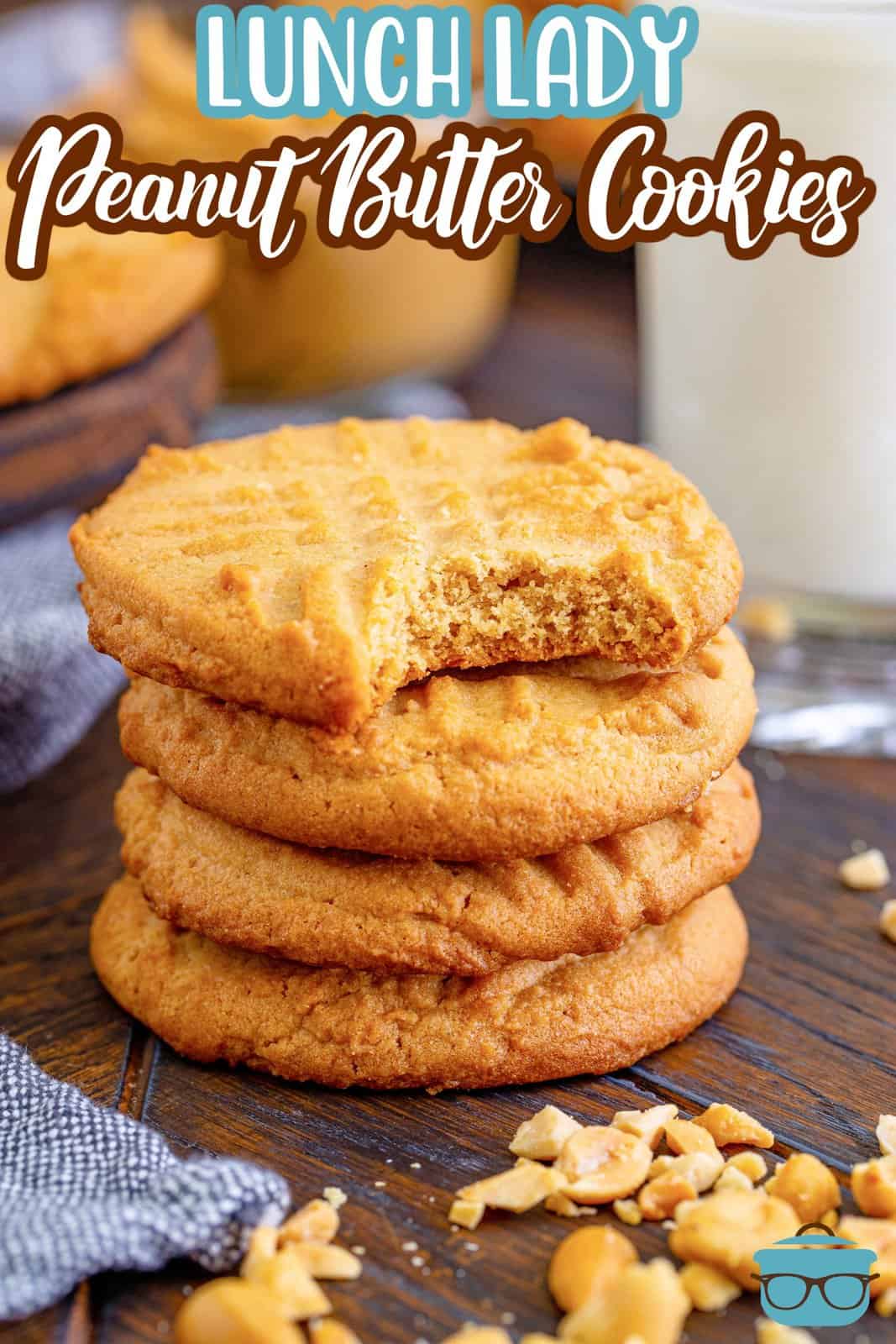 Pinterest image of stacked Lunch Lady Peanut Butter Cookies with bite taken out of top one.