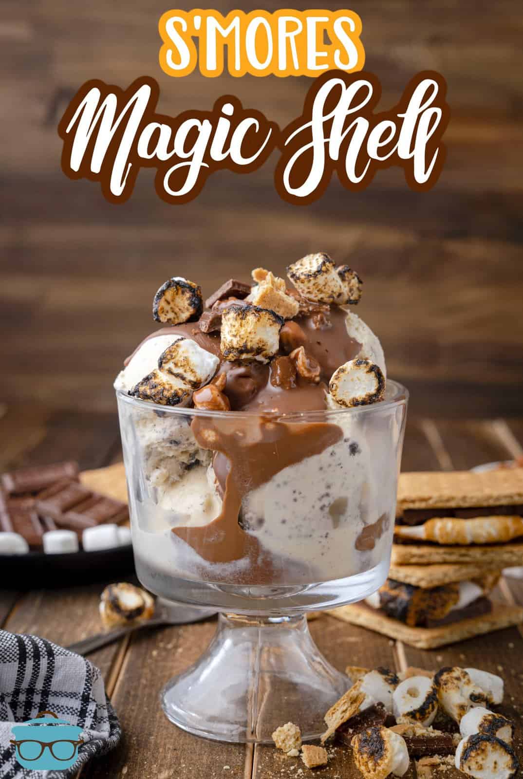 Pinterest image of S'mores Magic Shell in parfait glass dish over ice cream.