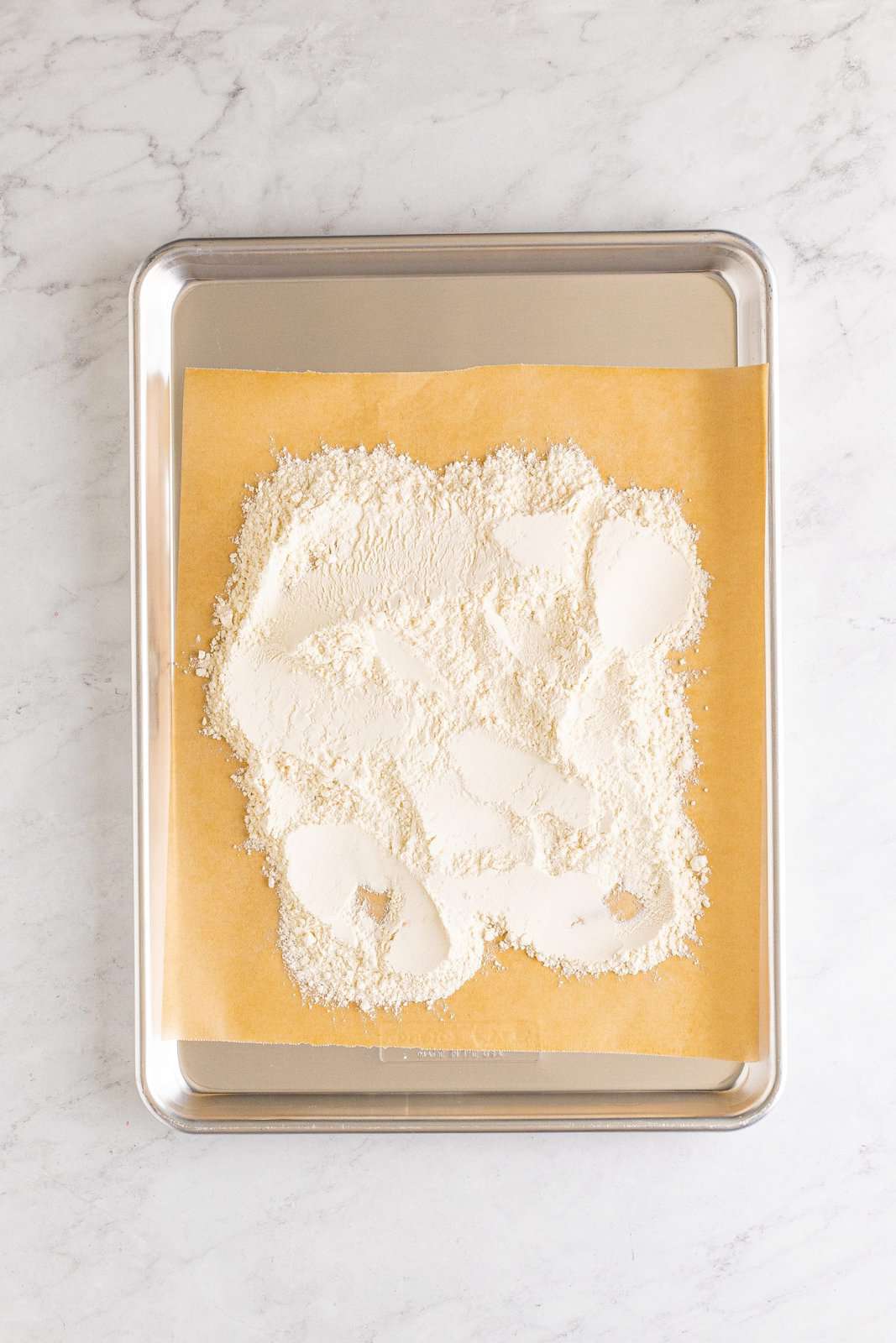 Flour on baking sheet.