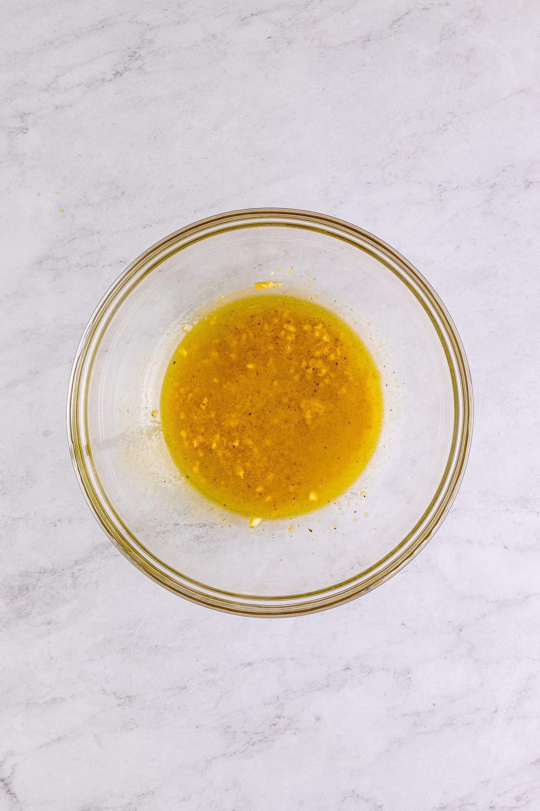Marinade mixture mixed together in bowl.