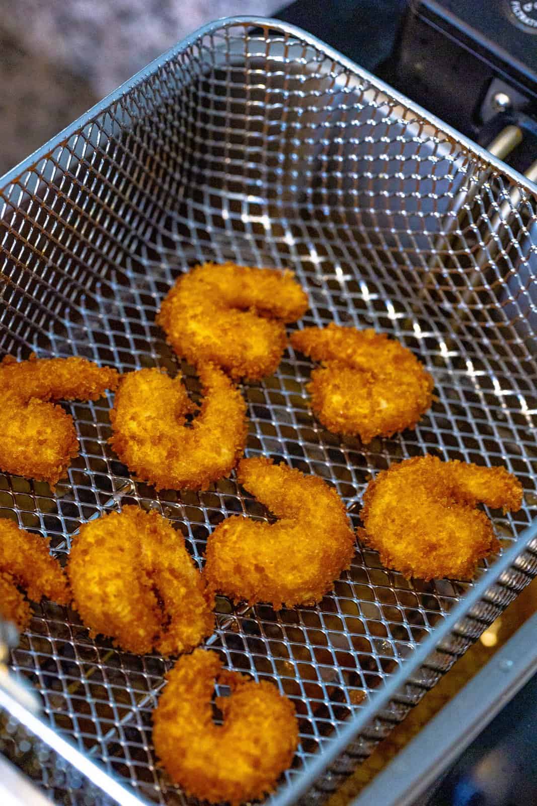 Shrimp coming out of fryer.