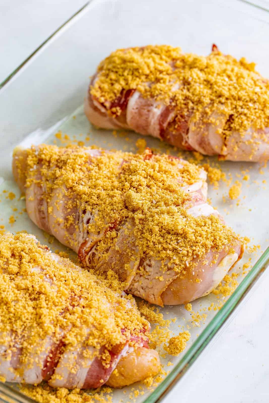 Brown sugar on top of bacon wrapped chicken.