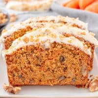 Close up square image of layered sliced Carrot Cake Loaf.