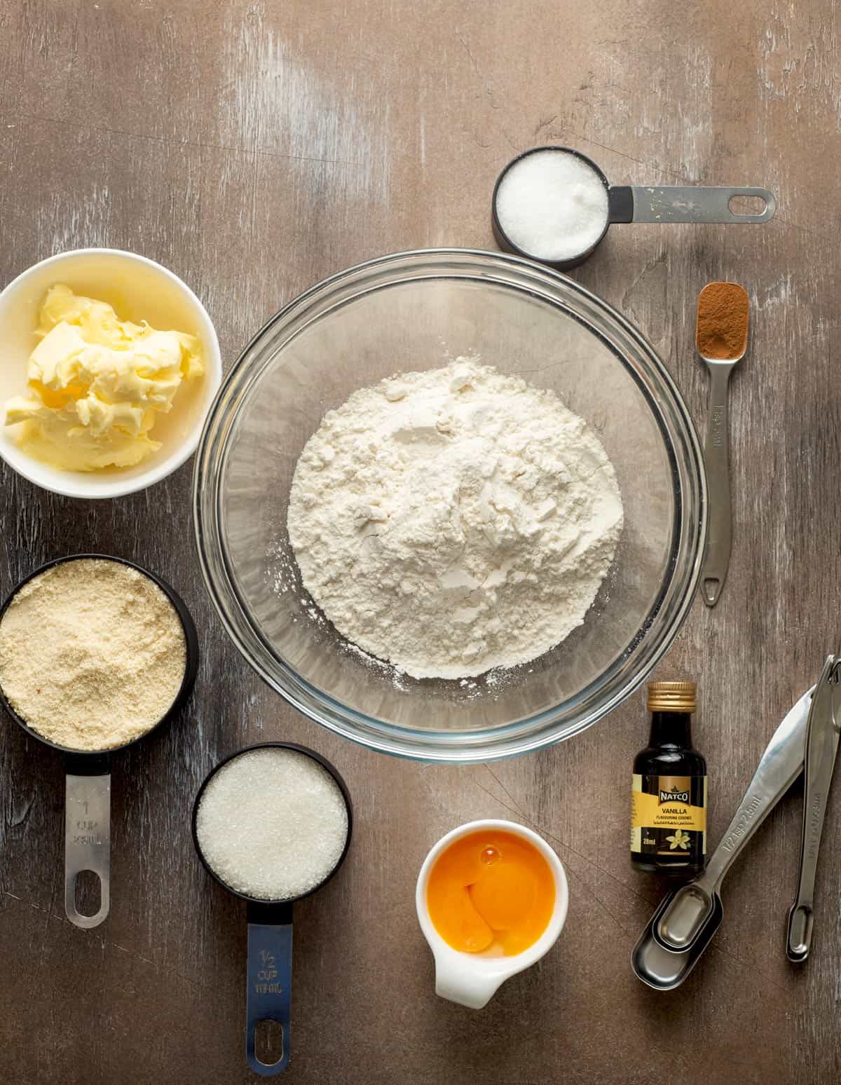 Ingredients needed: all-purpose flour, almond flour, granulated sugar, unsalted butter, egg yolks, vanilla extract and cinnamon.