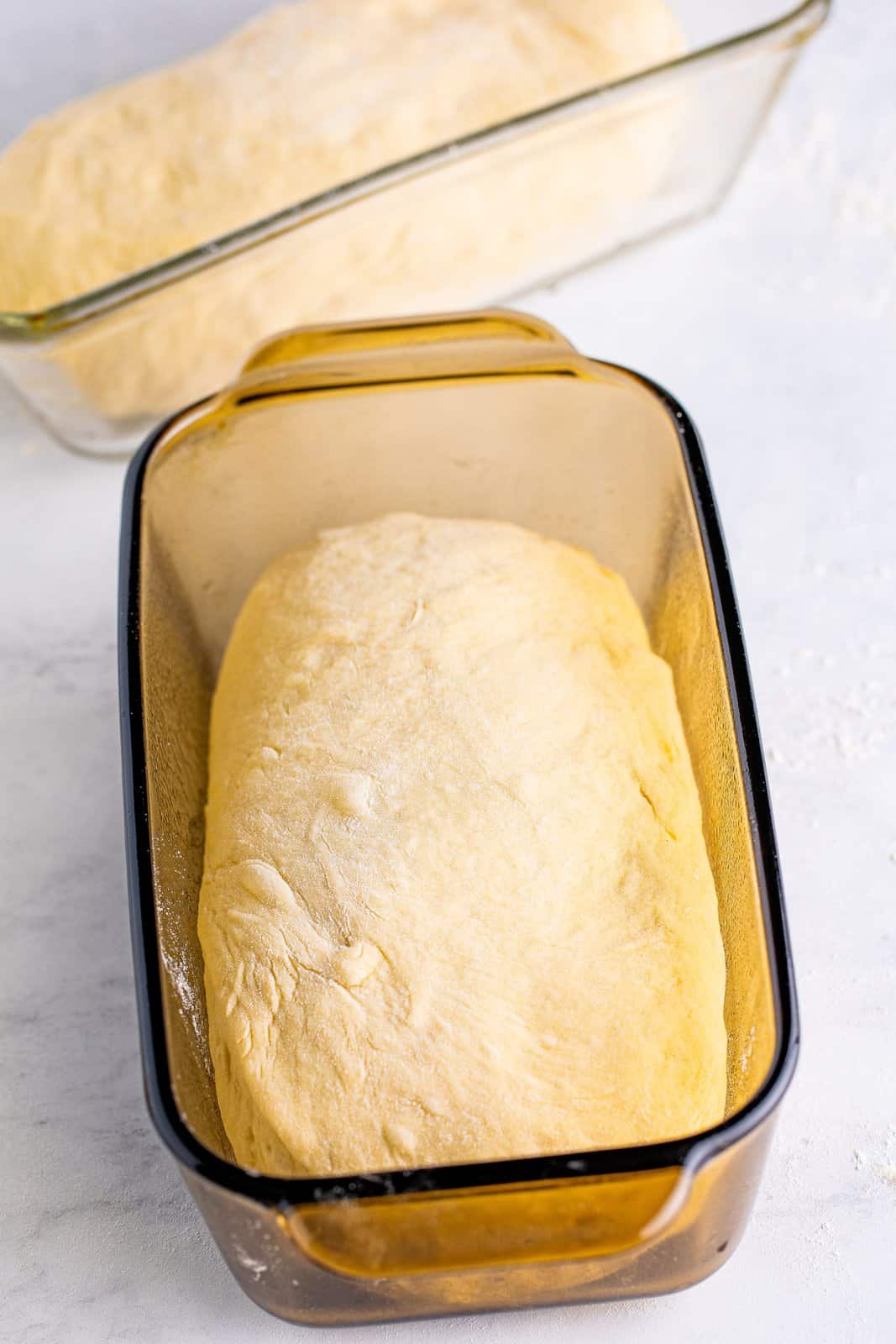 Dough placed in loaf pans.