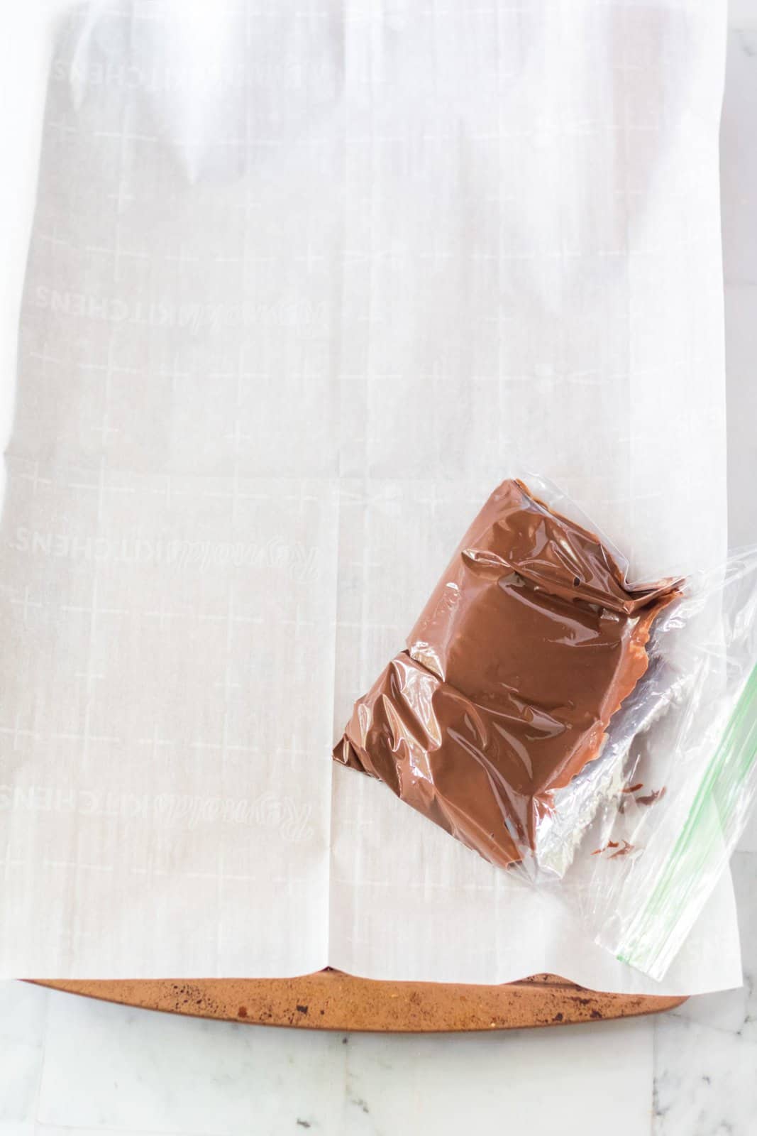 Melted chocolate placed into ziptop bag.