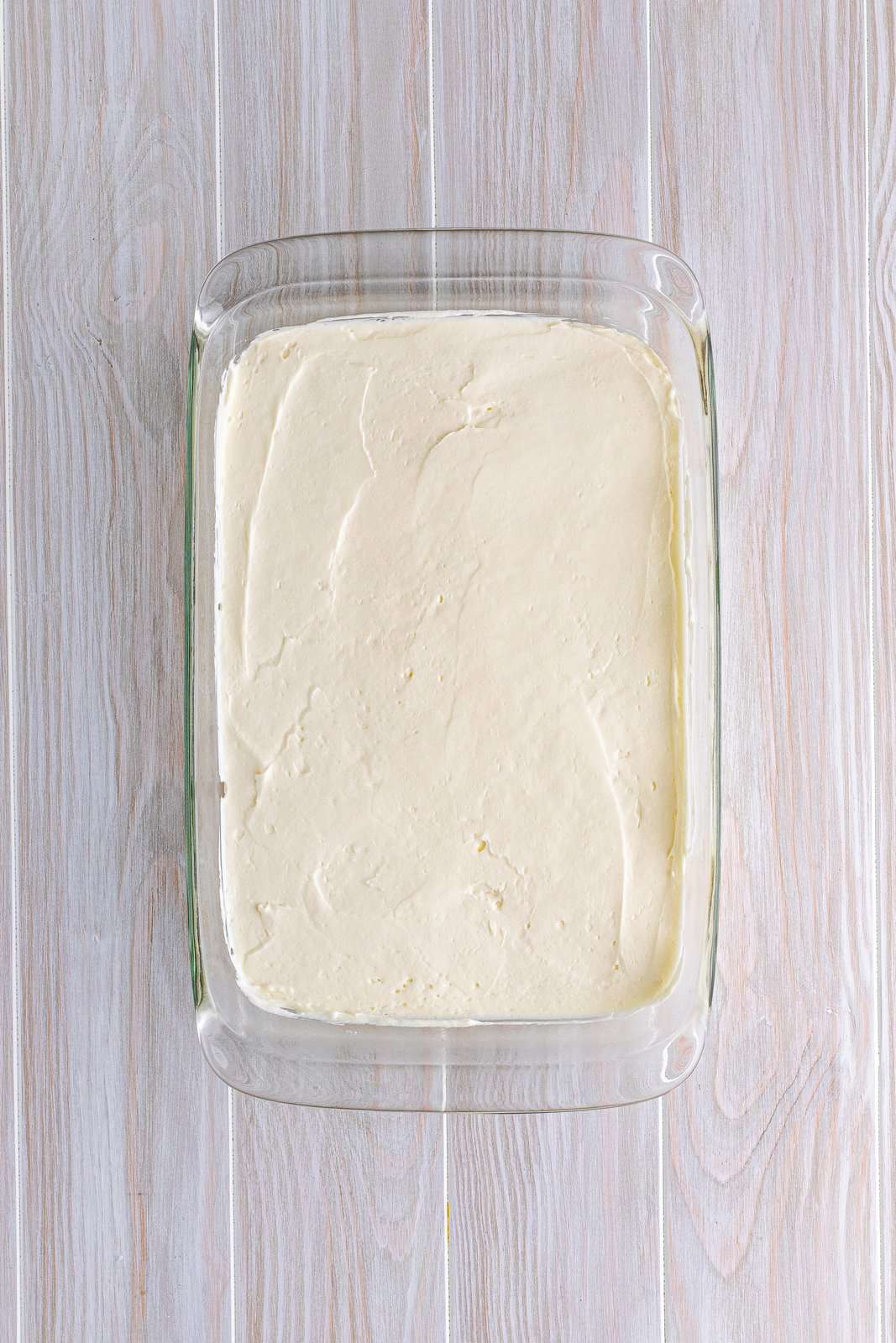 Cream cheese mixture spread over crust.