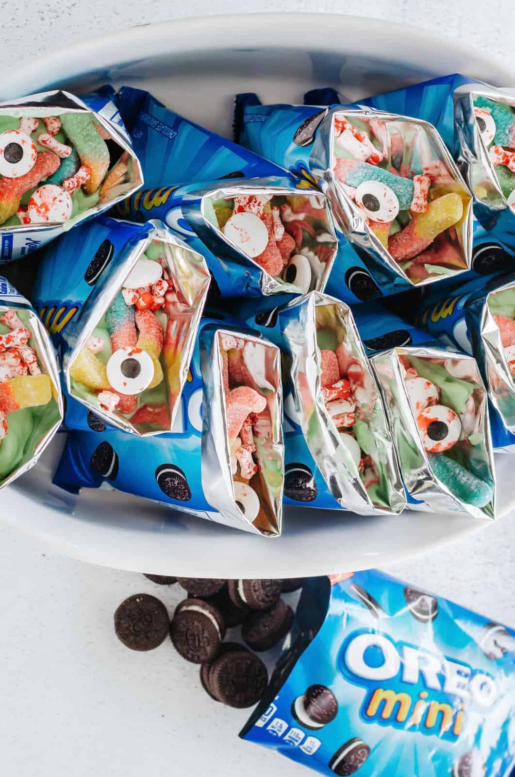 Candies placed into bags with Oreos and pudding.