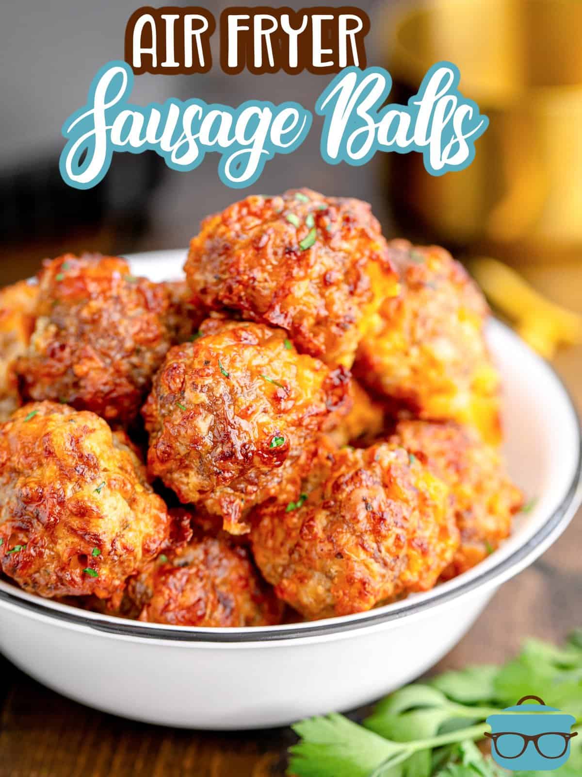 Pinterest image of Air Fryer Sausage Balls stacked in white bowl.