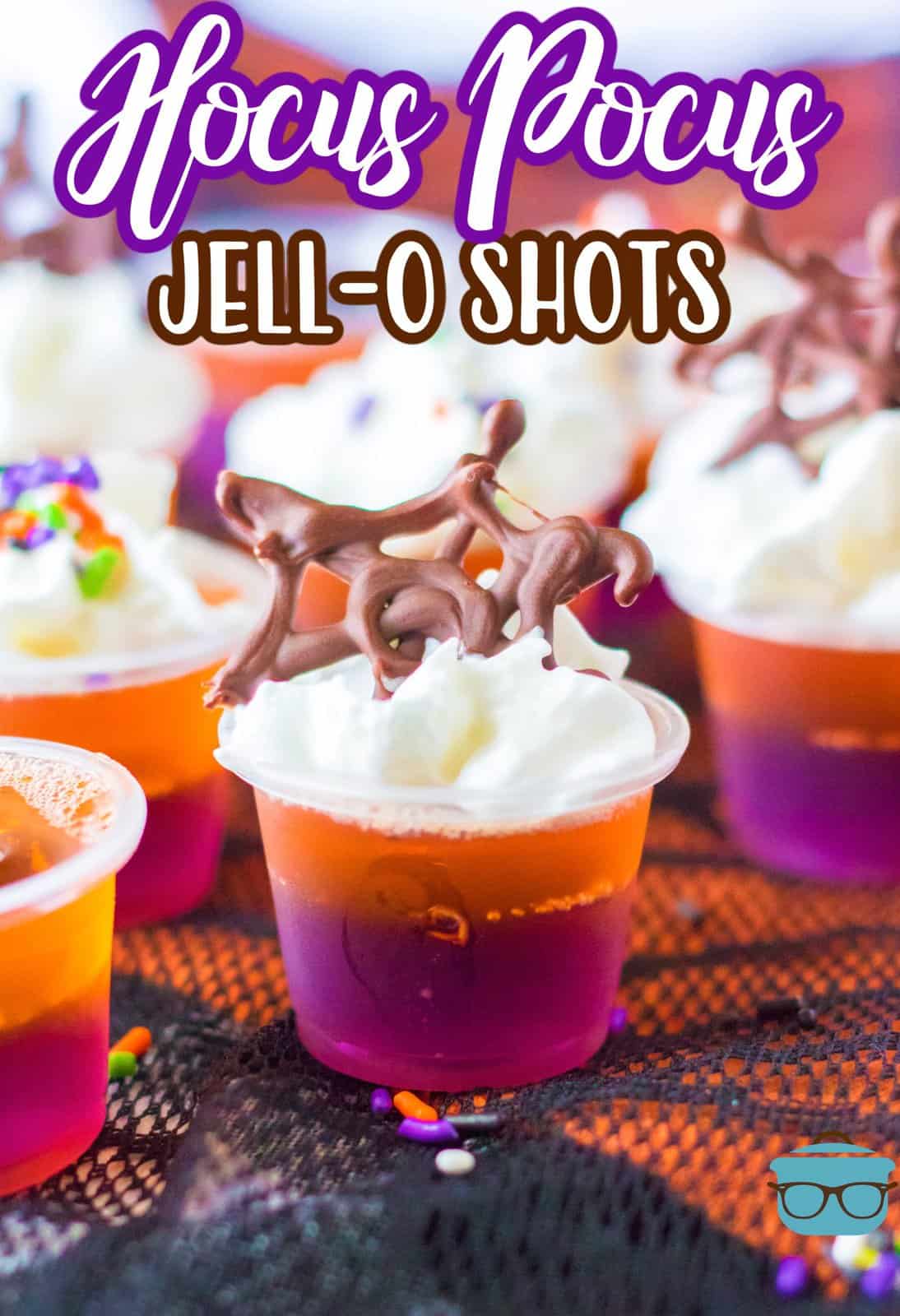 Pinterest image of finished and decorated Hocus Pocus Jell-O Shots on black lace.