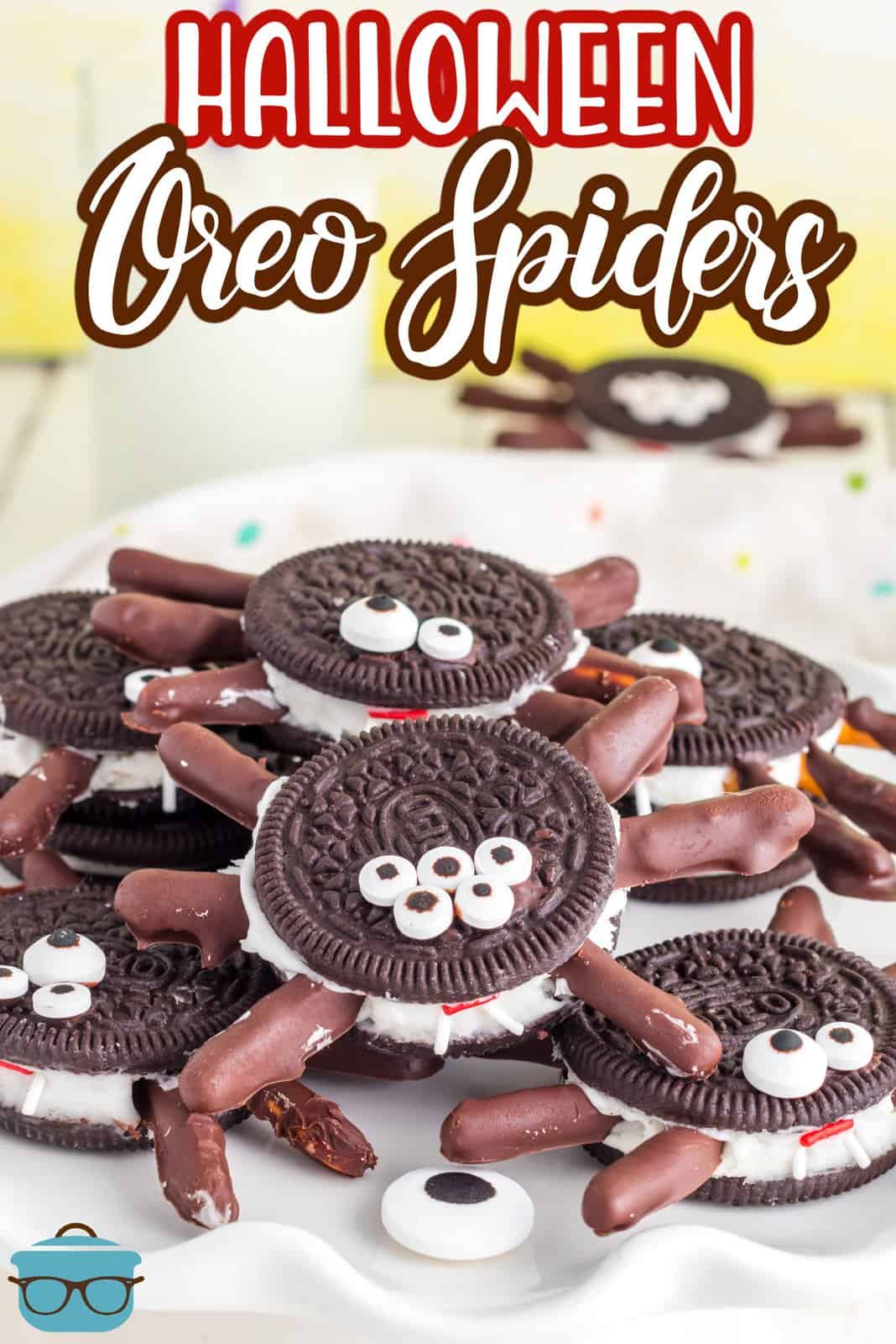 Pinterest image of stacked Halloween Oreo Spiders on plate.