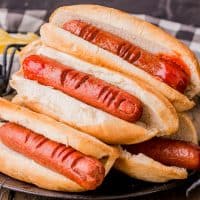 Close up square image of stacked Halloween Hot Dog Fingers.