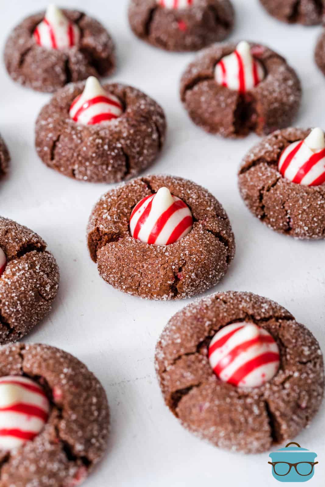 Chocolate Peppermint Kiss Cookies on parchment paper.