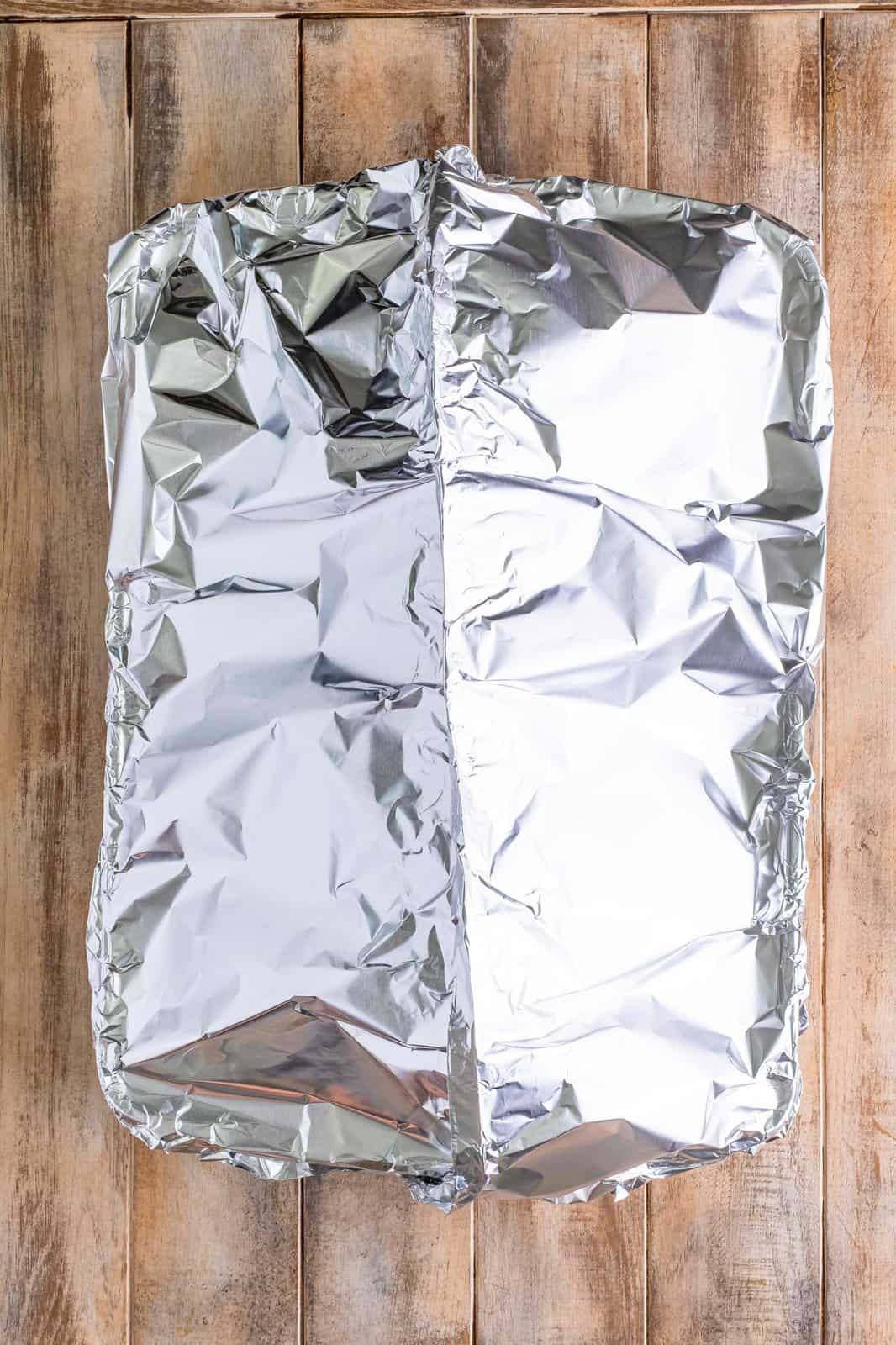 Ham tented with tin foil.
