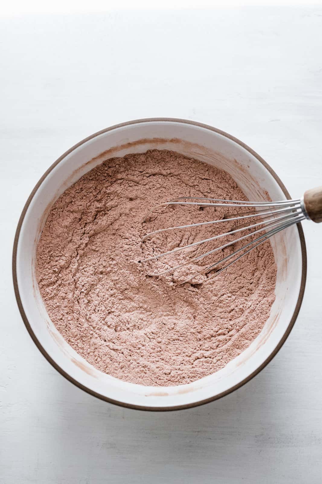 Flour, cocoa powder, baking powder and salt whisked together in bowl.