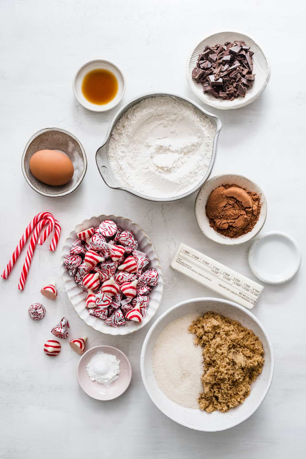 Ingredients needed: semi-sweet chocolate, unsalted butter, granulated sugar, light brown sugar, egg, vanilla extract, peppermint extract, all-purpose flour, unsweetened cocoa powder, baking powder, salt, crushed candy canes (optional) and Hershey’s candy cane kisses.