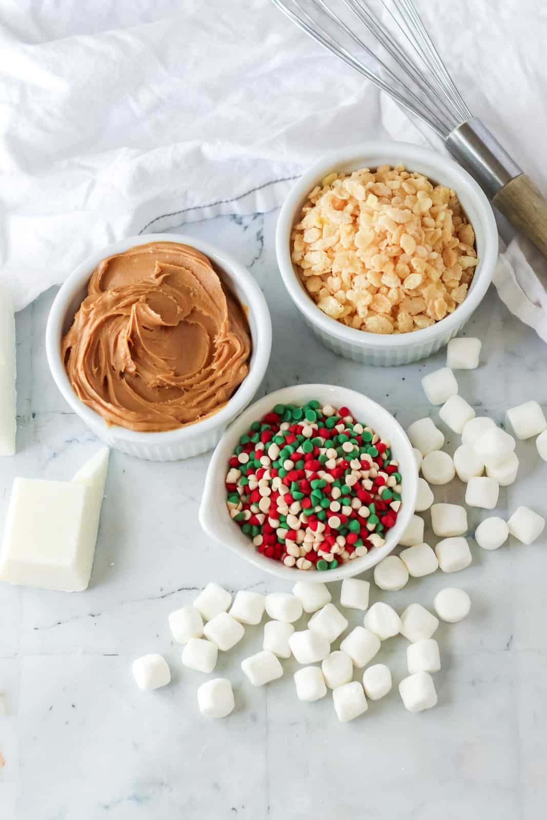 Ingredients needed: almond bark, creamy peanut butter, Rice Krispies cereal, mini marshmallows and holiday mini chips or sprinkles.