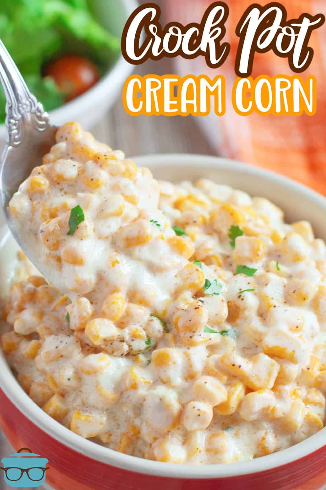Pinterest image with serving spoon holding up some of the Crock Pot Creamed Corn out of bowl.