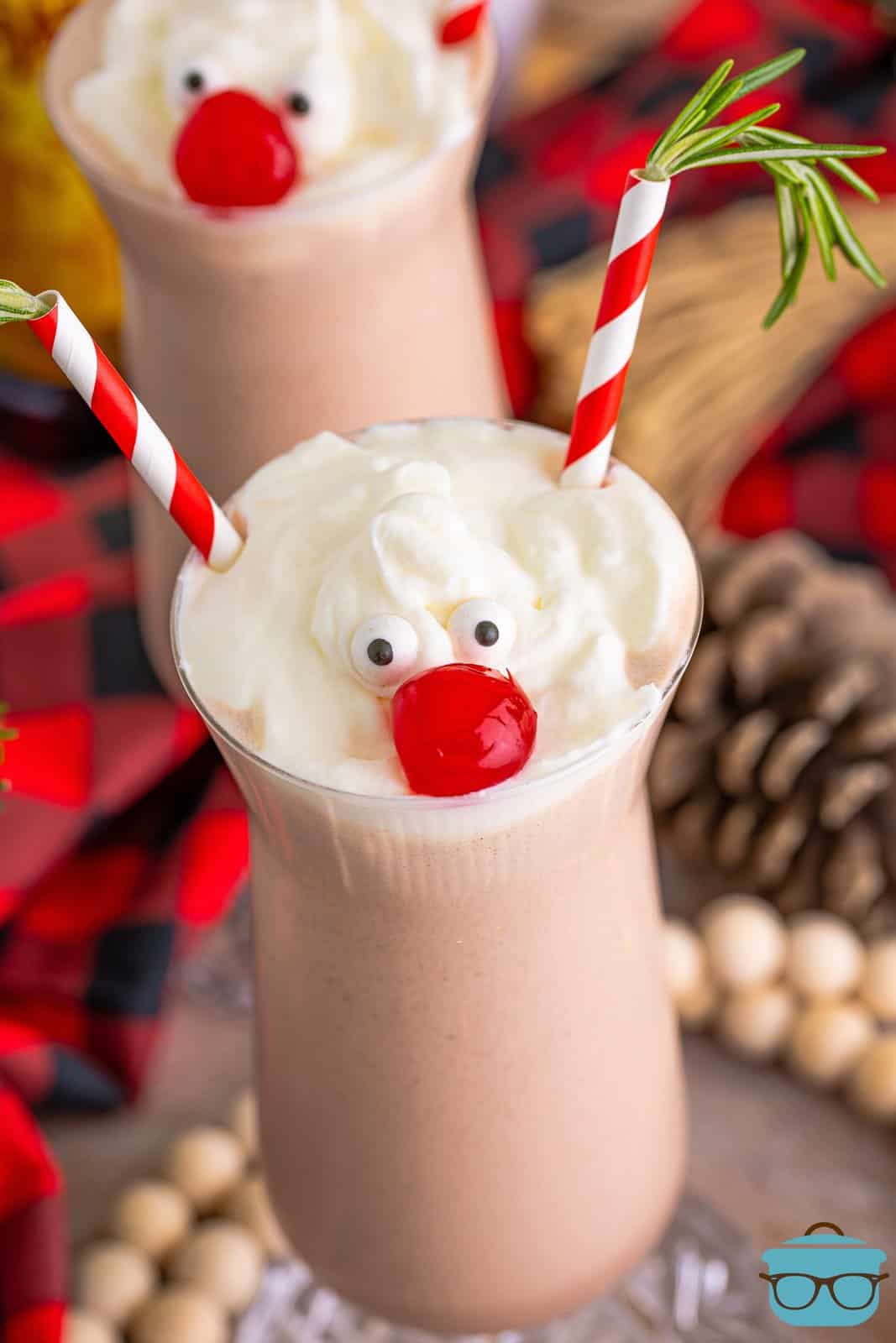 closeup overhead photo of two tall glasses of drunken Rudolph milkshake. 