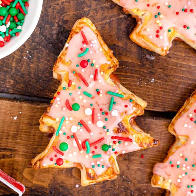 Close up overhead photo of one of the finished Christmas Tree Pop Tarts with icing and sprinkles.