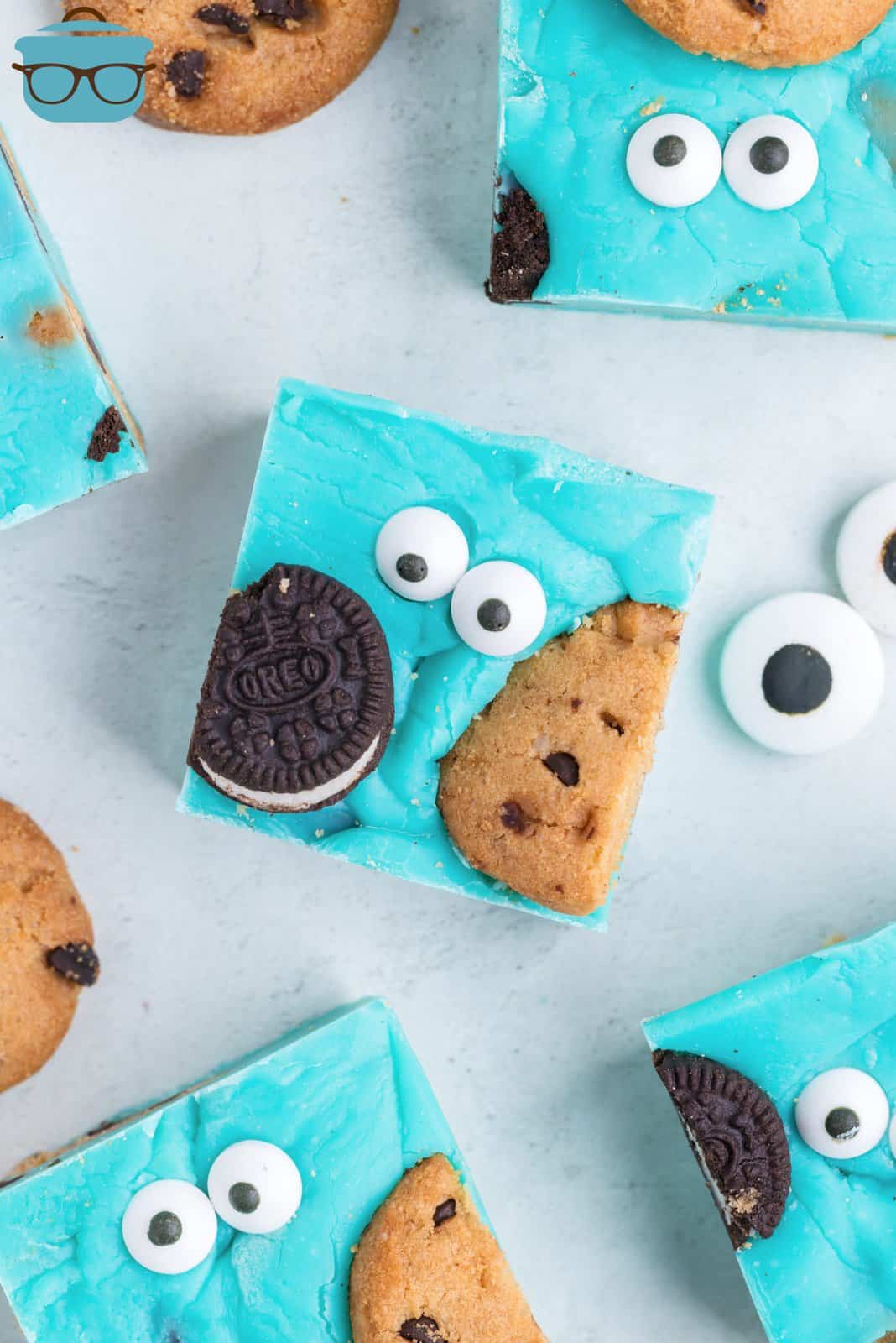 Pieces of Cookie Monster Fudge with cookies and candy eyes on top.